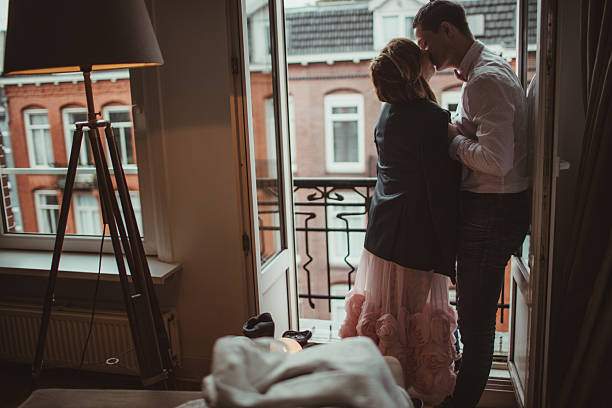 istock Kissing on the balcony 627628404