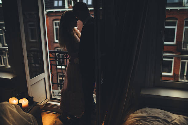 istock Kissing on the balcony 627628638