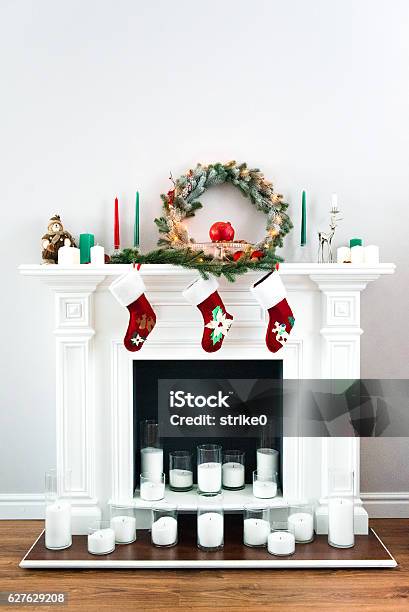 Great White Fireplace Decorated With Many Candles Stock Photo - Download Image Now - Christmas, Fireplace, Chimney