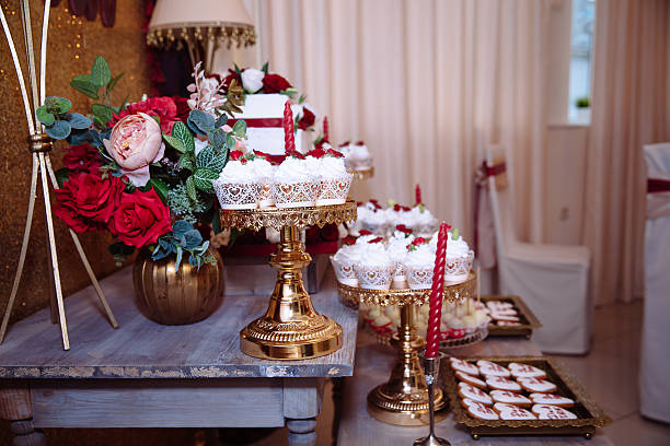 istock Candy bar, red colour, marsala. Table with wedding cake, sweets 627644994