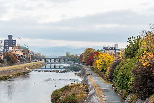istock Public walkway beside river for relaxing when autumn. 627645212