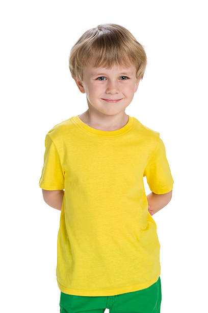 istock Cheerful little boy in a yellow shirt 627645830