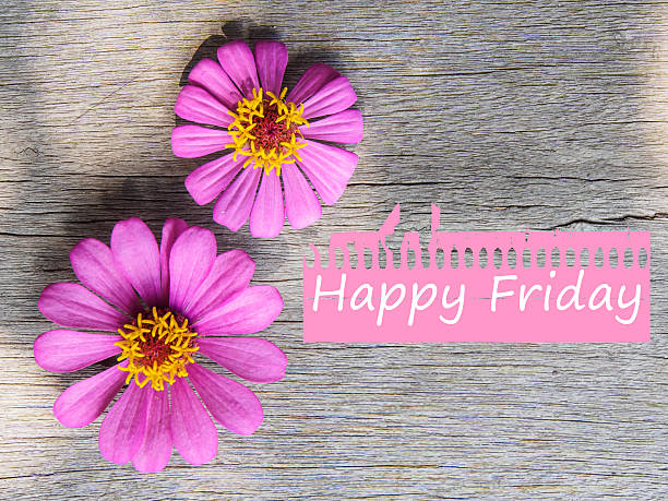 istock Top view pink flower and Happy Friday wording 627661786
