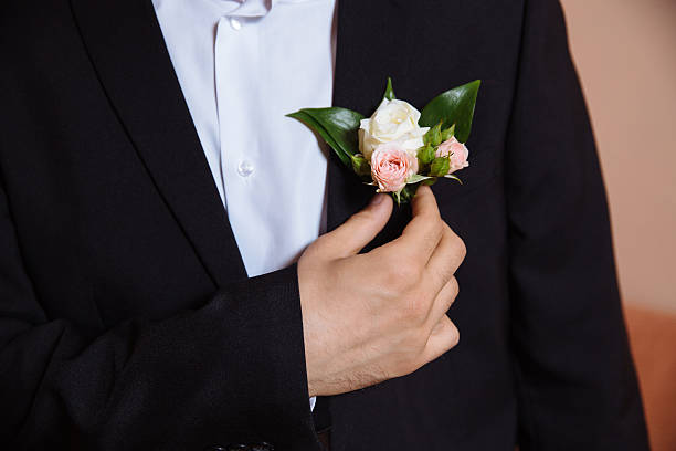 istock Groom in jacket with bouttonniere 627671476