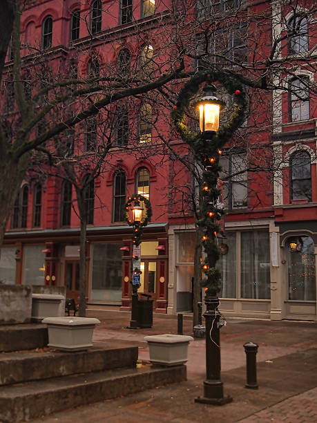 istock decorated lampposts at Christmastime 627671930