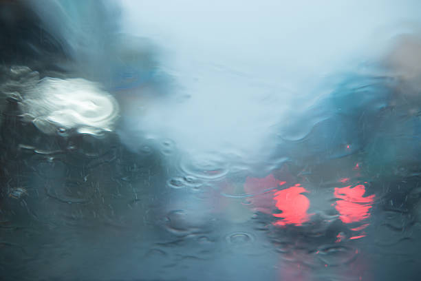 istock Flowing rain behind the mirror, rainny. 627673114