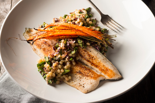 Pan Seared Trout with Carrots, Asparagus, Fregola and Radicchio.