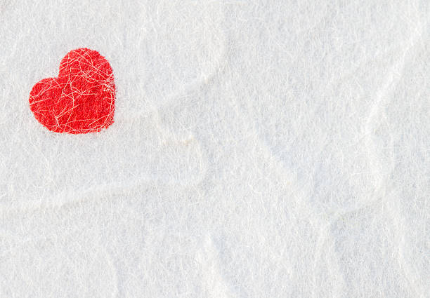 istock Red heart on white mulberry paper. 627712310