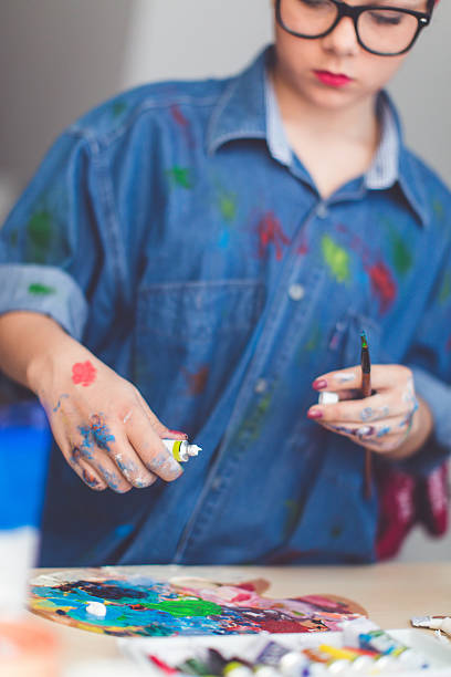 istock Mixing colour for new painting 627713122