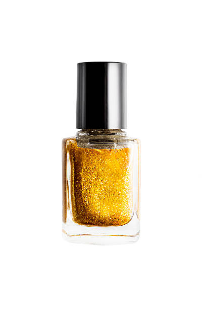 istock Gold nail polish drop 627713790