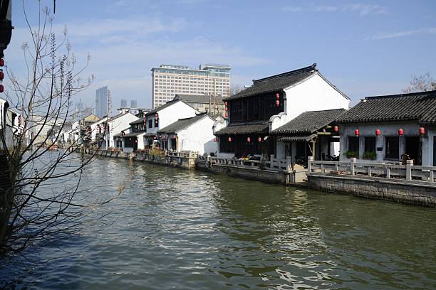 Old houses on Huancheng river in Wuxi, Jiangsu province, China Old houses along the Huancheng river in Wuxi, Jiangsu province, China grand canal china stock pictures, royalty-free photos & images