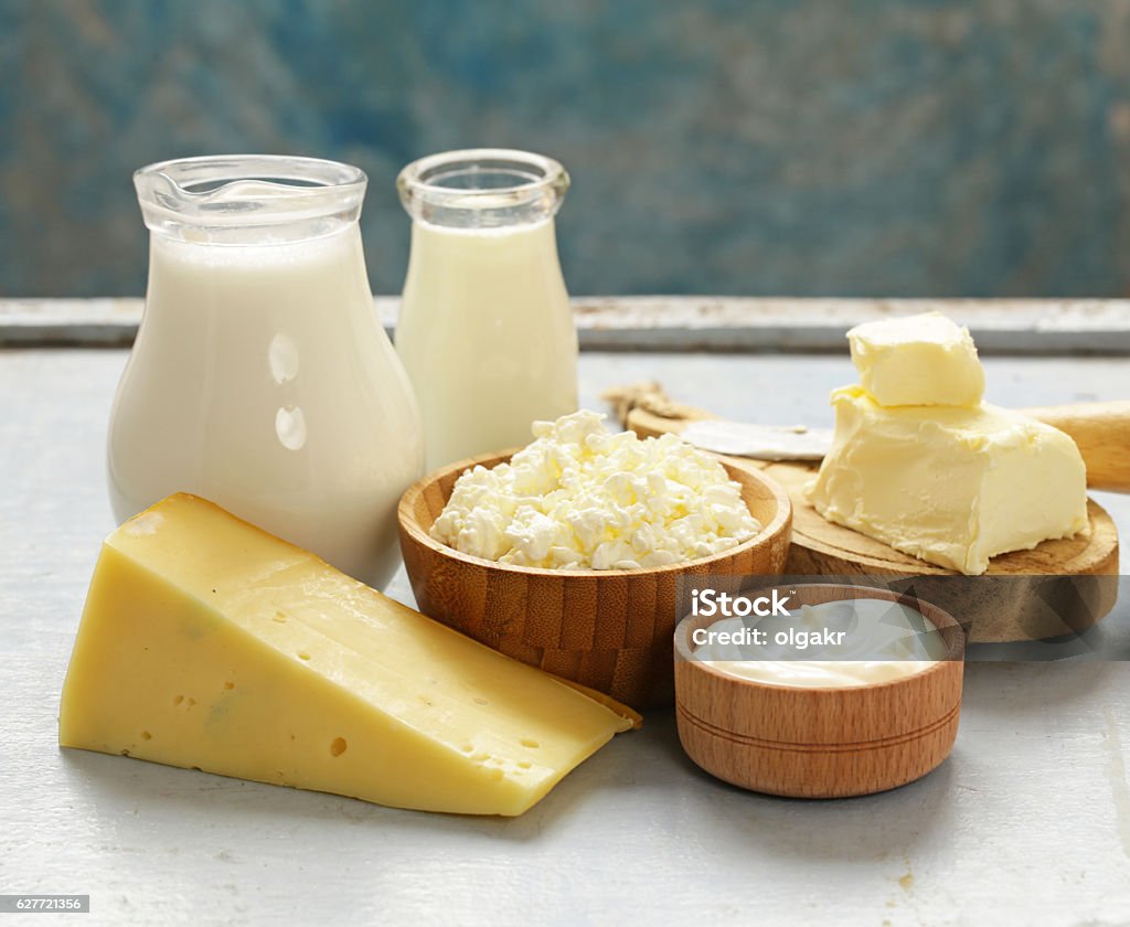 Assorted dairy products (milk, yogurt, cottage cheese, sour cream) Assorted dairy products (milk, yogurt, cottage cheese, sour cream) rustic still life Dairy Product Stock Photo