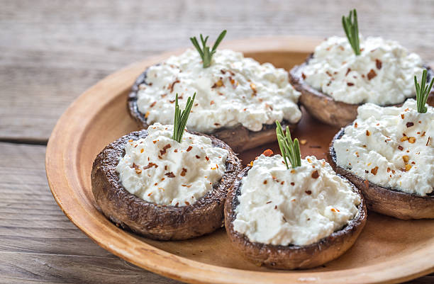 istock Baked mushrooms stuffed with cream cheese 627721442