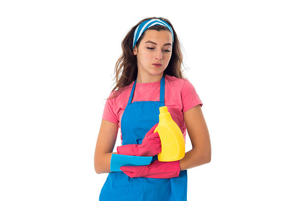 istock young maid woman with cleansers 627725886