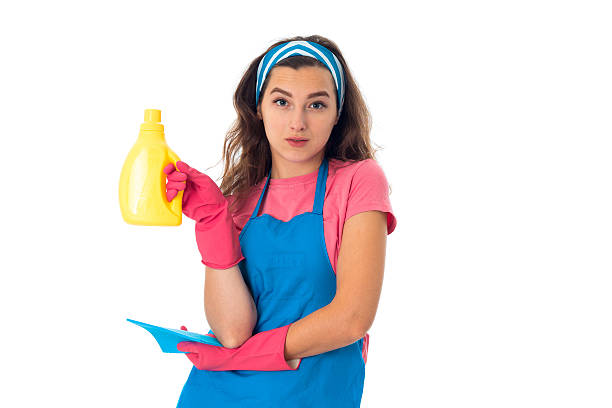istock young maid woman with cleansers 627725952