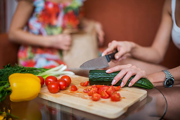 istock Women hands preparing dinner in a kitchen concept cooking, culinary 627727610