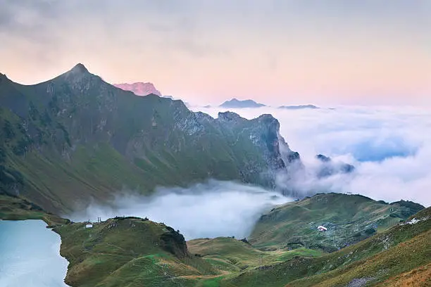 fog in mountains at sunrise, Bavaria, Germany