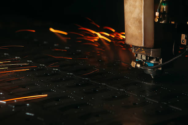istock Laser cutting machine cuts the metal with sparks 627728860
