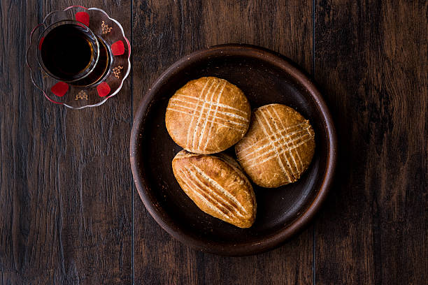 istock Turkish Pastry with tea / Karakoy Pogacasi 627740516