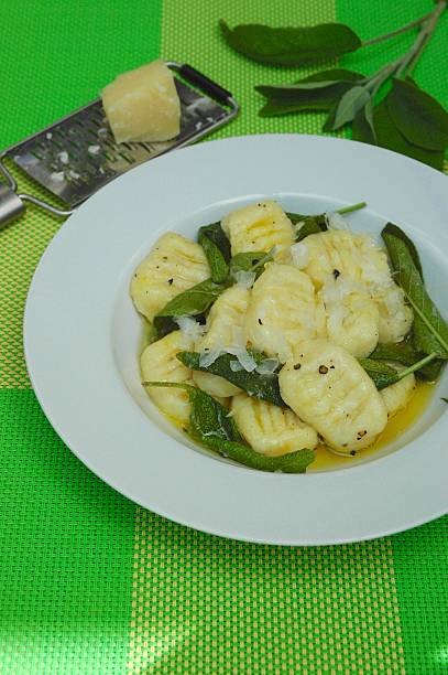Homemade Potato Gnocchi with Sage Butter Sauce and Parmesan Cheese