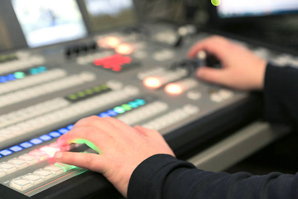 istock TV editor working with audio video mixer 627746084