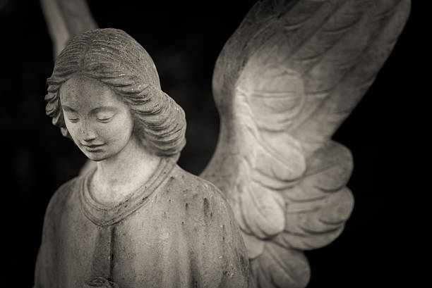istock guardian angel - black and white photo 627746124