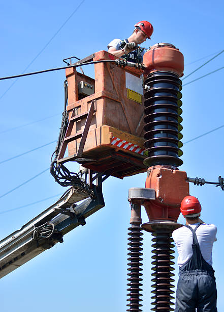 istock Two electricians working in substation 627746810