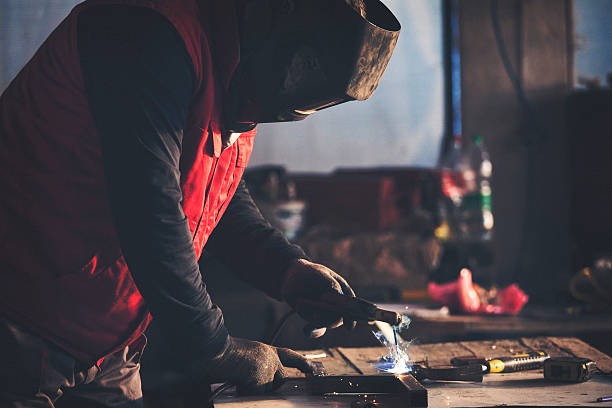 istock Man welding steel bar 627746848