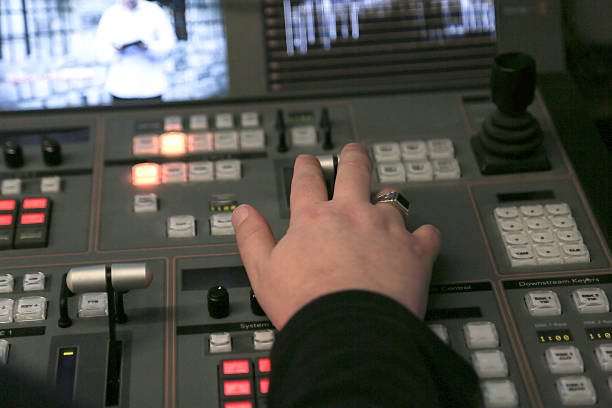 istock TV editor working with audio video mixer 627747222