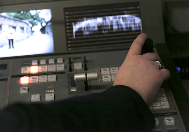 istock TV editor working with audio video mixer 627747428