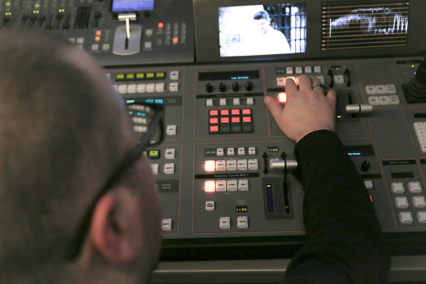 istock TV editor working with audio video mixer 627747798