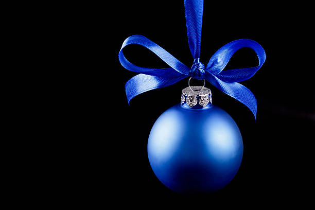 istock Hanging blue christmas ball at the background 627759370