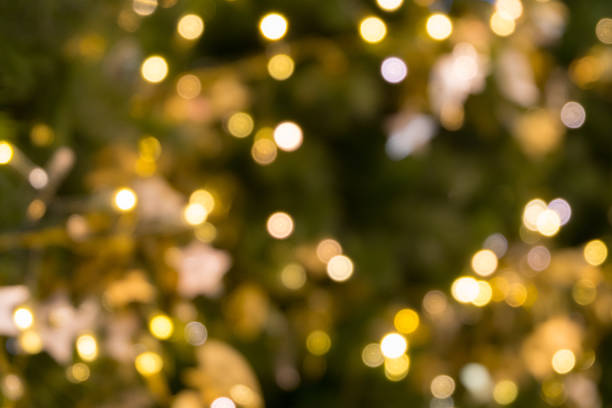 istock christmas tree bokeh light, holiday abstract background, blur defocused 627760152