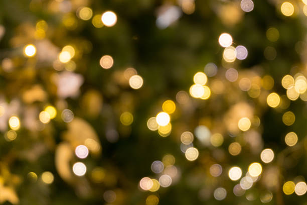 istock christmas tree bokeh light, holiday abstract background, blur defocused 627760210