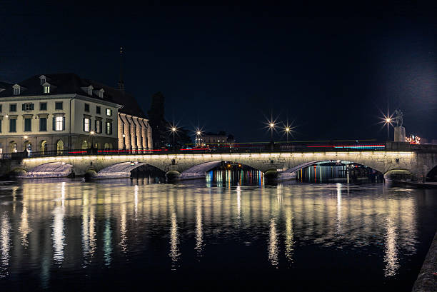istock Bridge on the Limmat at night in Zurich 627760418