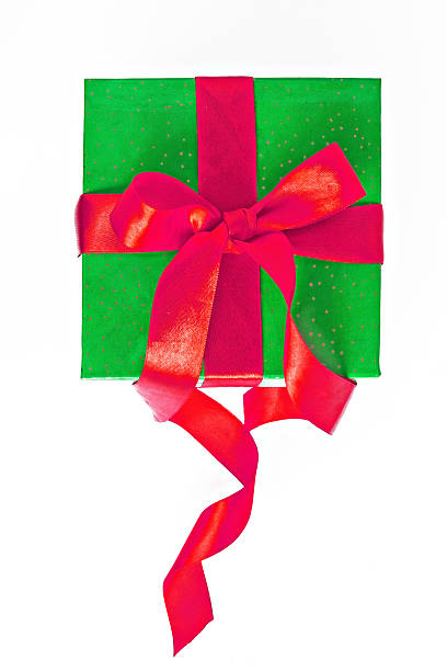 istock red and green Christmas gift with ribbon isolated 627761428