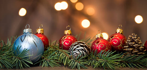 istock Christmas background with decorations on wooden board 627763212