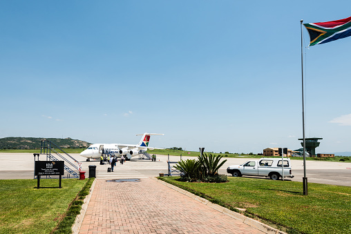 Nelspruit, South Africa - November 29, 2016: Cosy departure scene at Nelspruit Mpumalanga airport with the tower in the background. It serves travellers to the famous Kruger National Park near Nelspruit in South Africa.