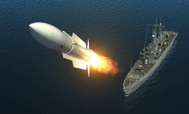 missile launch from a warship on the high seas - sea battle imagens e fotografias de stock