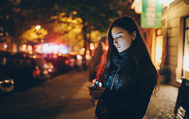 istock Young woman texting in Berlin 627770628