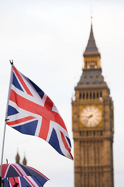 istock Union Jack flag and Big Ben in background 627770918