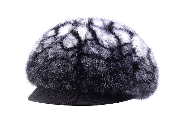 istock Women's fur hat with a visor is isolated on white 627776266