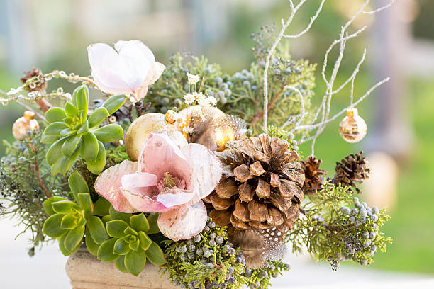 istock Bouquet has Christmas tree branches and artificial flowers. 627776578