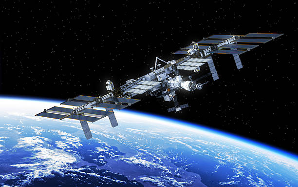 International Space Station Orbiting Earth International Space Station Orbiting Earth. 3D Illustration. international space station stock pictures, royalty-free photos & images