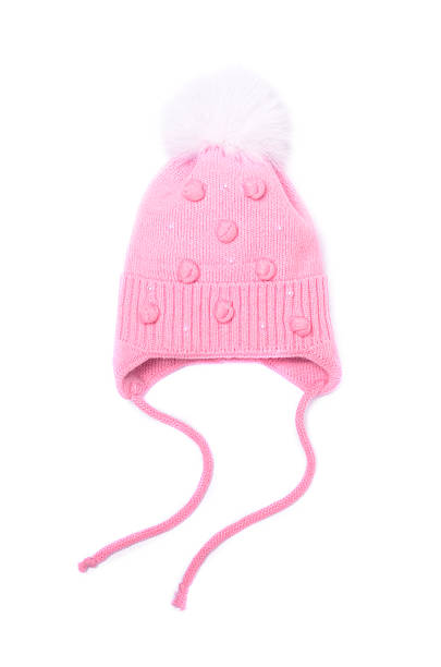 istock pink baby hat isolated on white 627778860