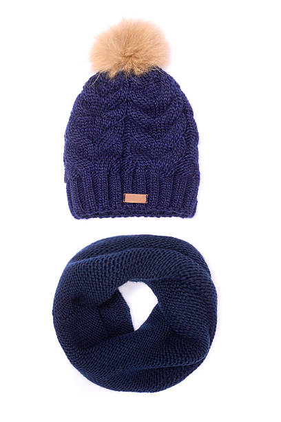 istock blue bubo hat and scarf isolated on white 627779584