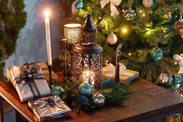 istock Christmas evening by candlelight. classic apartments with a fireplace, 627780036