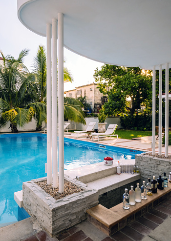 Havana, Cuba - October 9, 2016: Pool Bar and cabana Exterior of  old Villa in Vedado, suburbs of Havana. This property is privately owned by Cuban entrepreneur. It serves as his residence as well as \