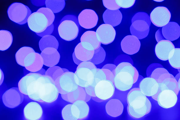 istock Blured purple and blue christmas light background 627781446