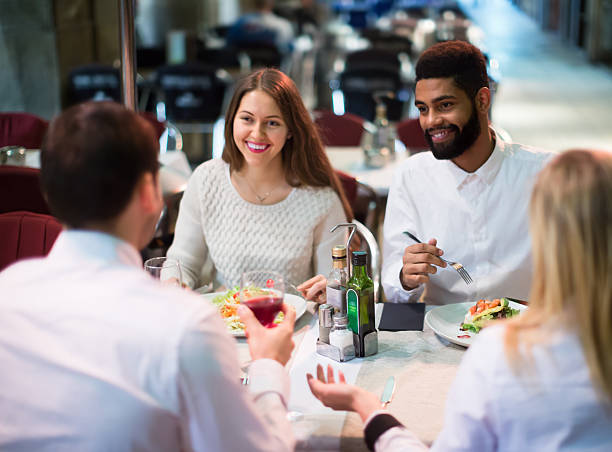 istock middle class people enjoying food in cafe terrace 627781580